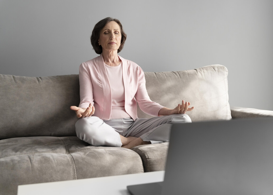 900 full-shot-woman-meditating-couch